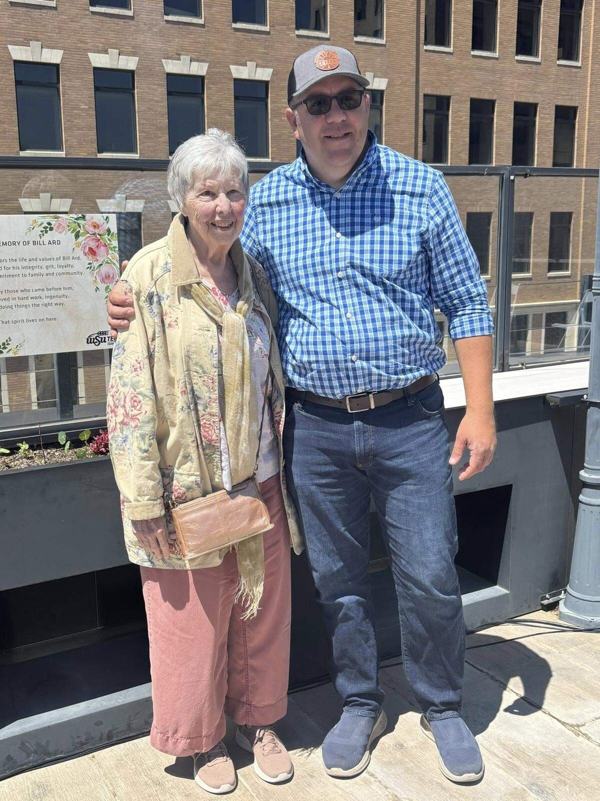 Donna Ard, left, donated money toward the completion of NICHE’s rooftop garden in memory of her late husband, Bill. She’s pictured at the garden with Thomas Montiel, the farmer that NICHE hired to oversee the garden.