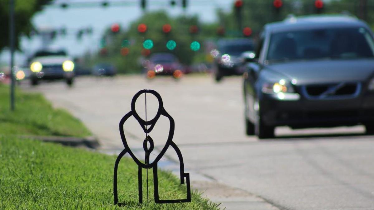 Sign art by Wichita-based artist Kanbee has reappeared by the side of Wichita roads.