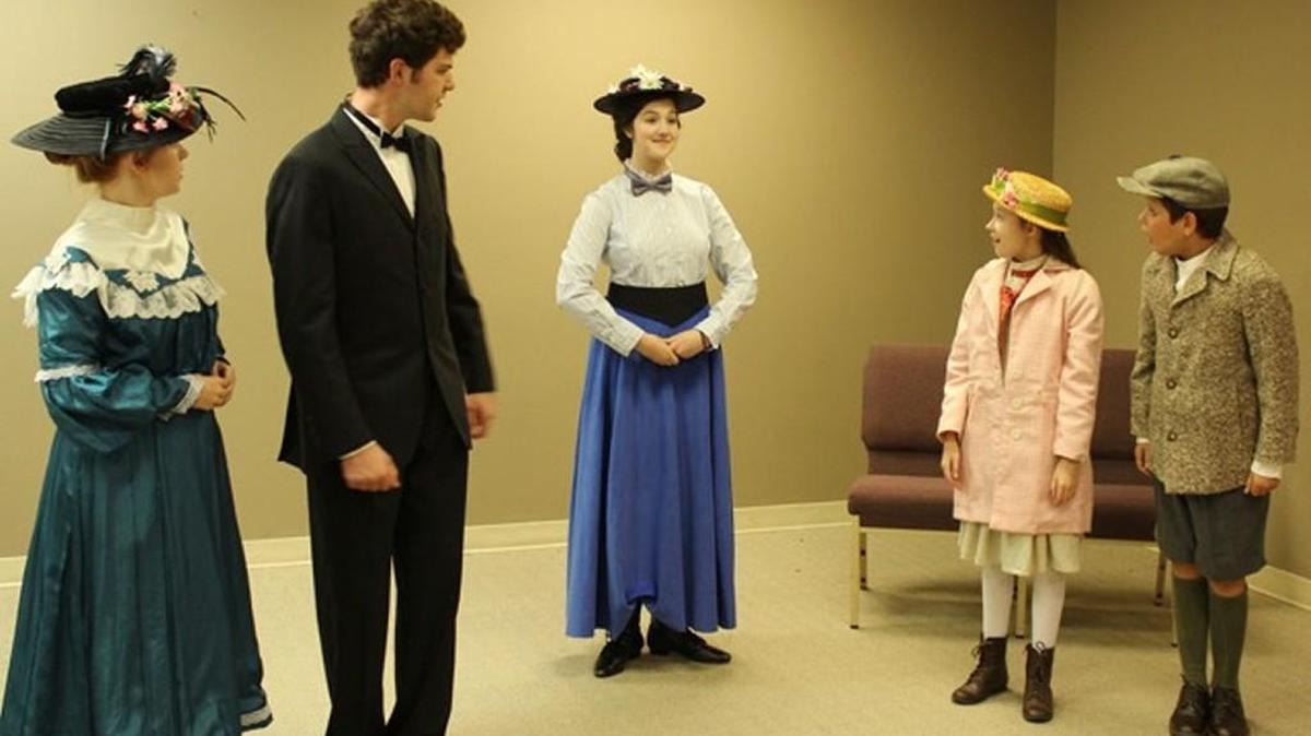 Mary Poppins with the Banks family in CYT’s production of “Mary Poppins.”