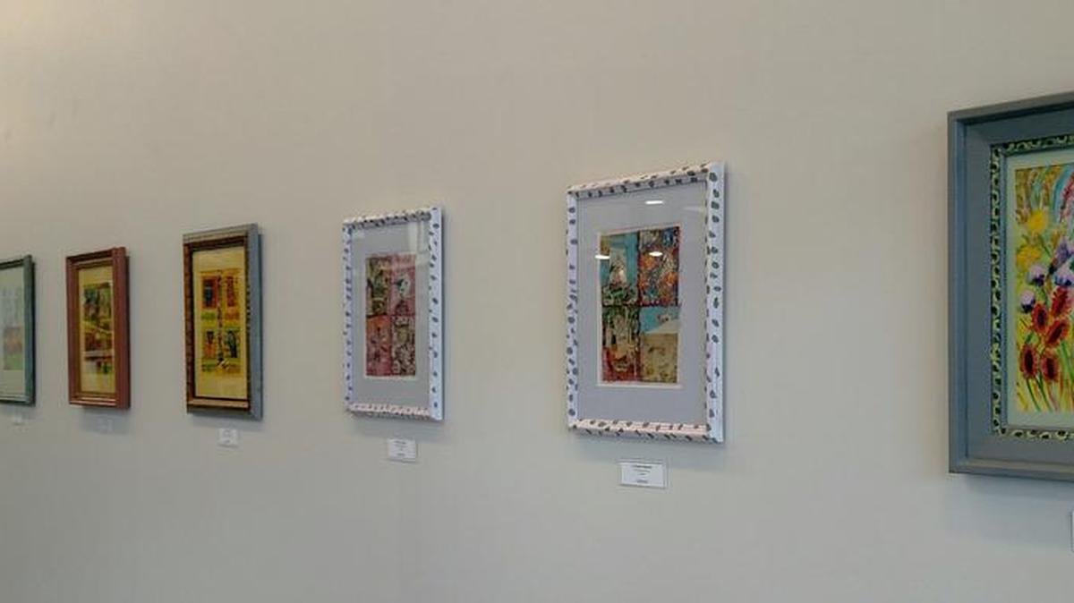 Artwork hangs at Art & Frame as part of Novelene Ross’ new exhibition, “Real Obsessions.”
