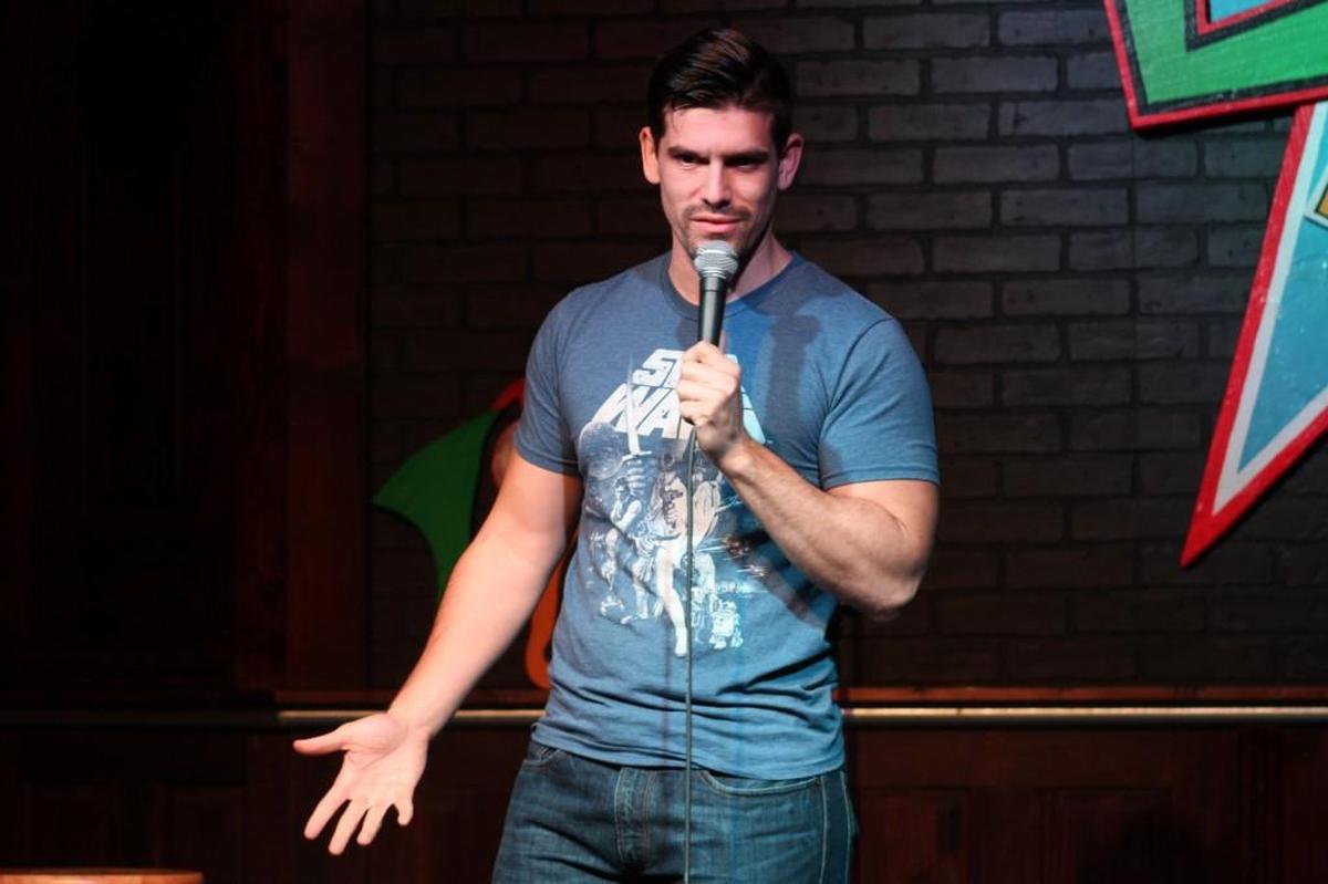 A comedian performs at the old Loony Bin Comedy Club, which closed in 2023 after almost 25 years in business.