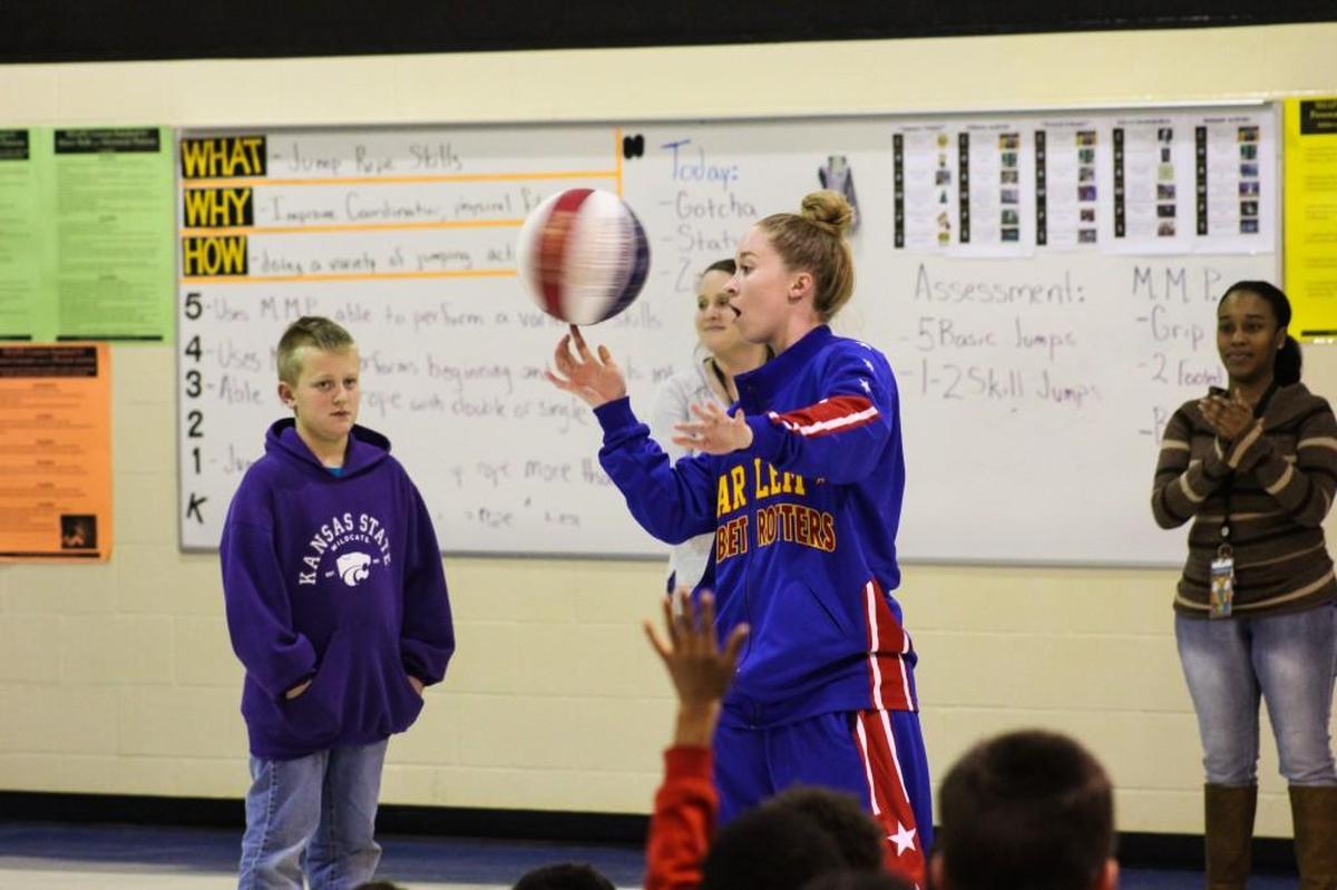 Hannah “Mighty” Mortimer does tricks for schoolchildren at Wichita’s Jackson Elementary School earlier this week.