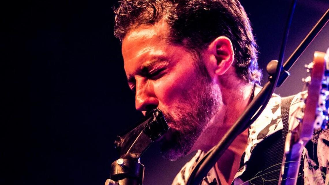 Hamilton Loomis plays the harmonica. The musician will teach a beginner’s harmonica class in Wichita next weekend.