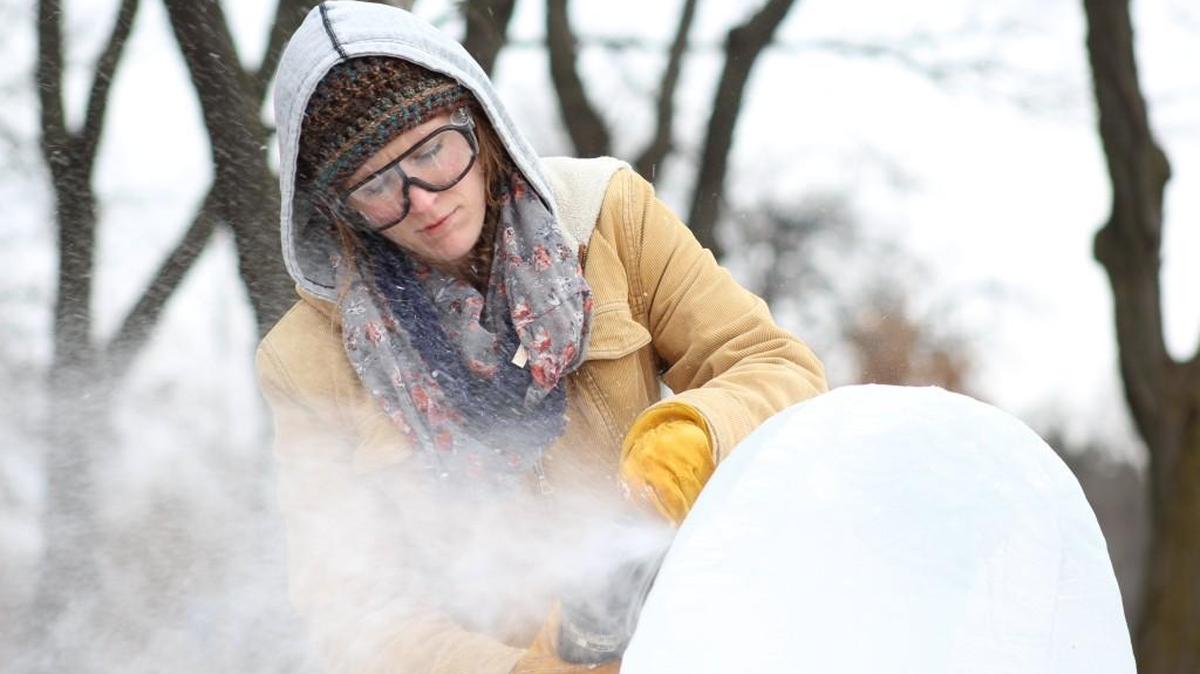 Local ceramics artist Katie White carves an ice sculpture at the Wichita Art Museum’s first ice-sculpting event in 2016. This year, Mike Miller will return to make art with ice, along with Erin Raux and Brady Hatter.