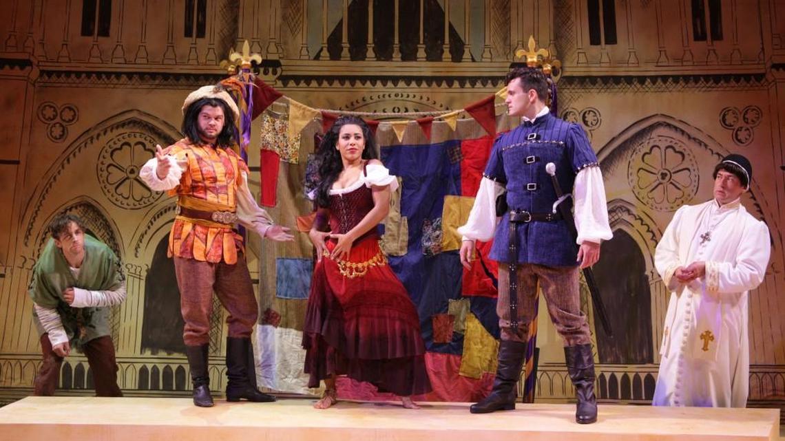 The Feast of Fools outside Notre Dame cathedral brings together bellringer Quasimodo (Skyler Adams), gypsy king Clopin (Britton Hollingsworth), dancing gypsy Esmeralda (Erin Clemons), captain of the guard Phoebus (Stephen Mark Lukas) and Archdeacon Claude Frollo (Monte Riegel Wheeler).