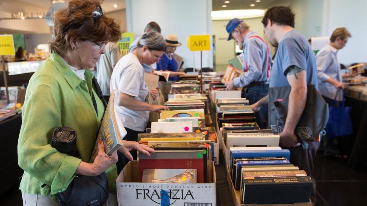 Attendees peruse merchandise at last year’s Art and Book Fair at the Wichita Art Museum.