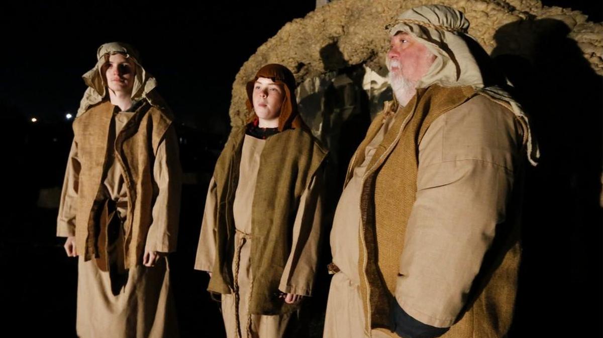 Jake, 16, Will, 14, and Warren Kunkle, left to right, portray shepherds in Bethlehem during a rehearsal for the “Drive-Thru Christmas” at the Countryside Christian Church Thursday.