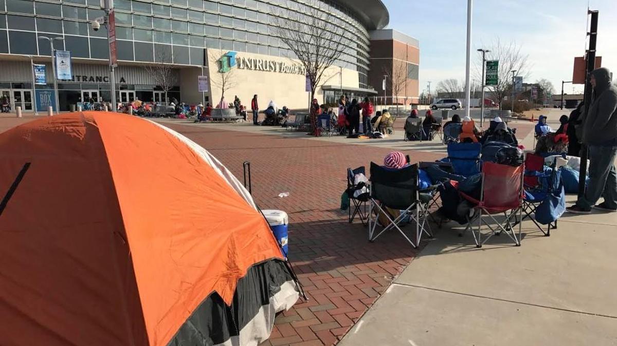 Tents and lawn chairs were a common sight in front of Intrust Bank Arena on Friday. People with general-admission tickets are camped out in front of the arena for the Twenty One Pilots show Friday night.