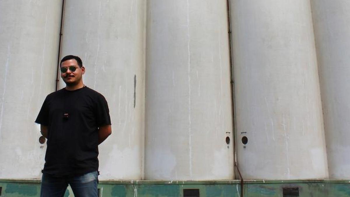 Armando Minjarez in front of a potential canvas for his “Horizontes” project, which received a $100,000 grant from the Knight Foundation.