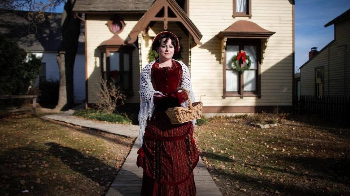Cowtown volunteer Mercedes Kanda wears a Victorian-era outfit she made herself. Cowtown will hold its annual Victorian Christmas event this weekend.