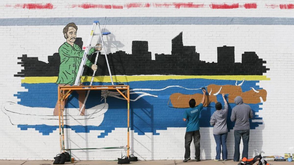 This mural, painted by Richard Garcia, Jessica Nellis and Philip Nellis, was created during the first Avenue Art Days, in October 2015.