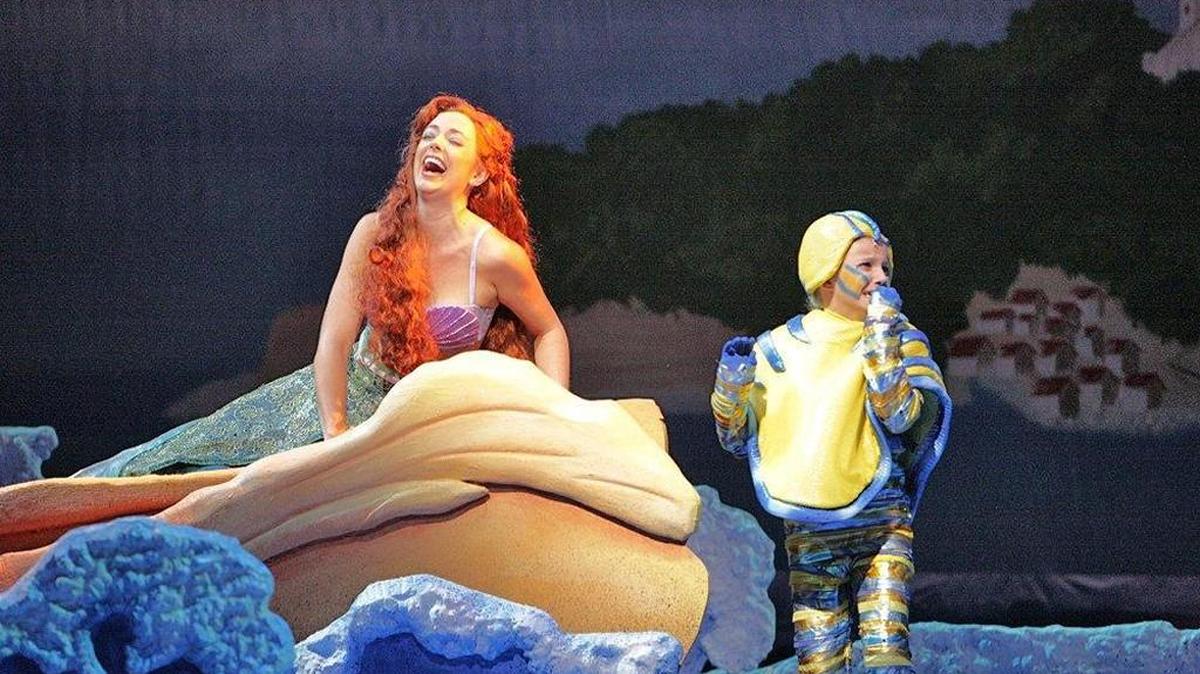 Desi Oakley (Ariel) and Addison Baker (Flounder) were featured in the 2011 Music Theatre Wichita production of Disney's “The Little Mermaid,” with sets by J. Branson and costumes by Leon Dobkowski. The musical will return for Music Theatre Wichita’s 2018 season.