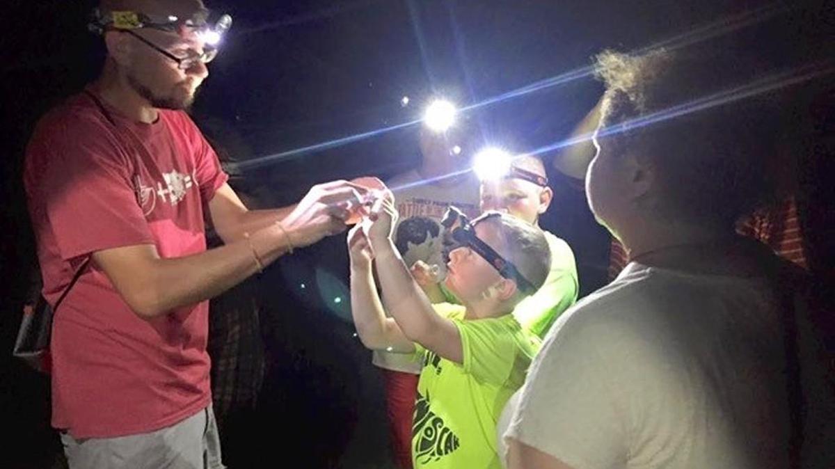 Biology professor Dustin Wilgers will lead the spider night at Great Plains Nature Center.