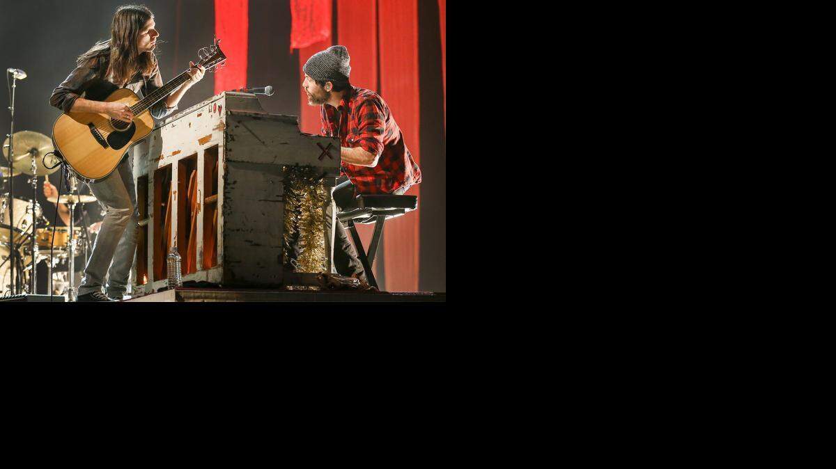 
Seth Avett, left, and his brother Scott Avett, right, entertain the crowd at Intrust Bank Arena on Thursday. (Feb. 26, 2015)
