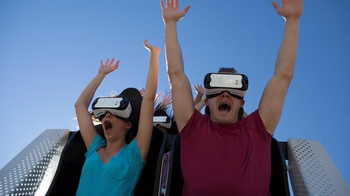 Visitors ride the new Superman: The Ride Virtual Reality Coaster at the park in Agawam, Mass.