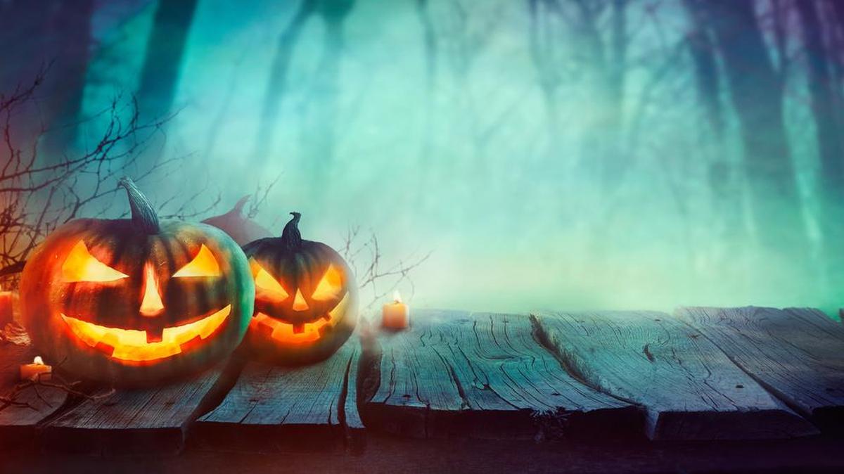 Teal pumpkins signal allergy-friendly treats to trick-or-treaters on Halloween.