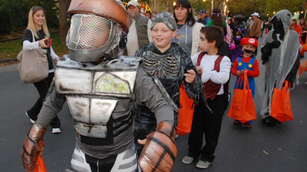 Emerson Horning was dressed as Atom as he paraded at the Sedgwick County Zoo during the annual Night of the Living Zoo event.