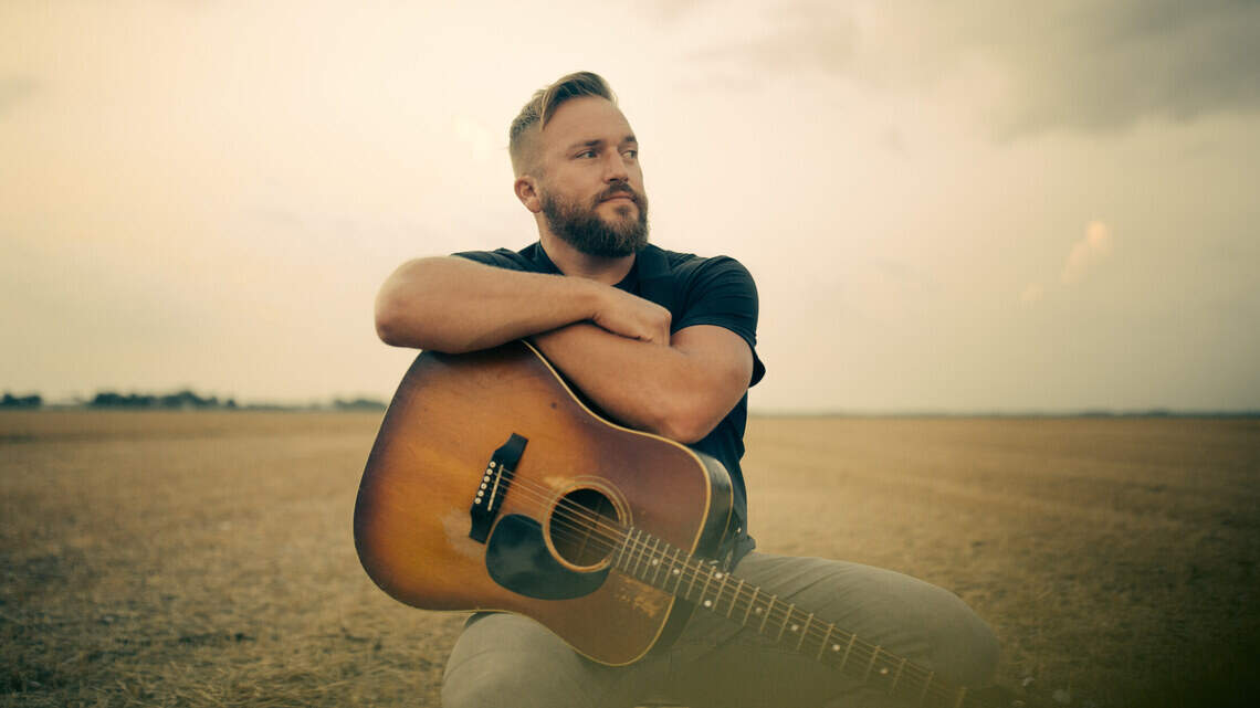 Country singer Logan Mize finds success, satisfaction out of Nashville and in Kansas
