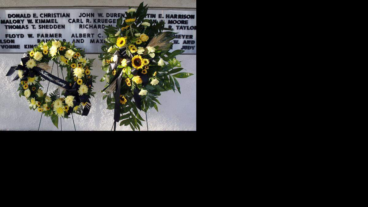 
Wreaths were placed at a memorial service the morning of Oct. 2, 2013, at Wichita State University for those in the Oct. 2, 1970, plane crash that killed football team members, coaches and supporters in Colorado.
