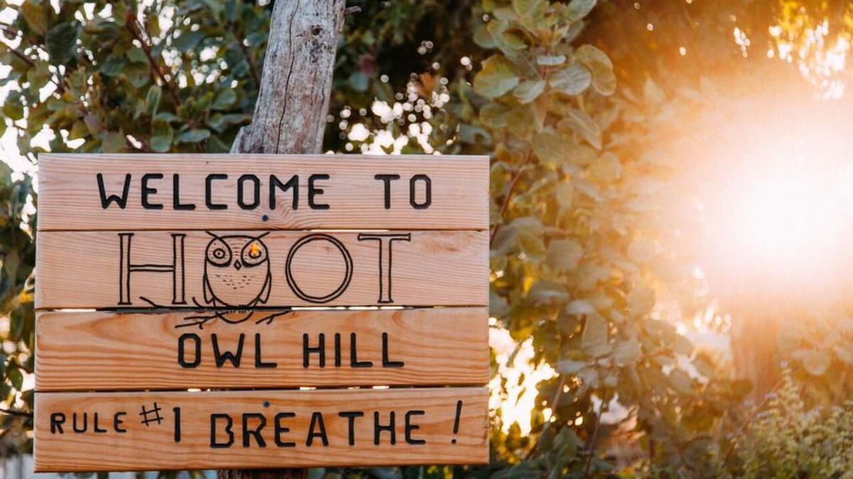 Rule 1: “Breathe” sign greets visitors to Hoot House Hill near Paola.