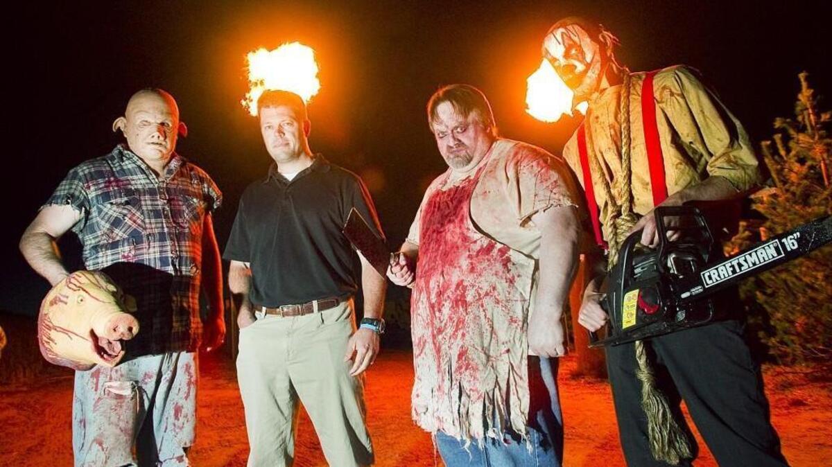 
Prairie Pines owner Kip Scott, second from left, has been operating Field of Screams for 12 years.
