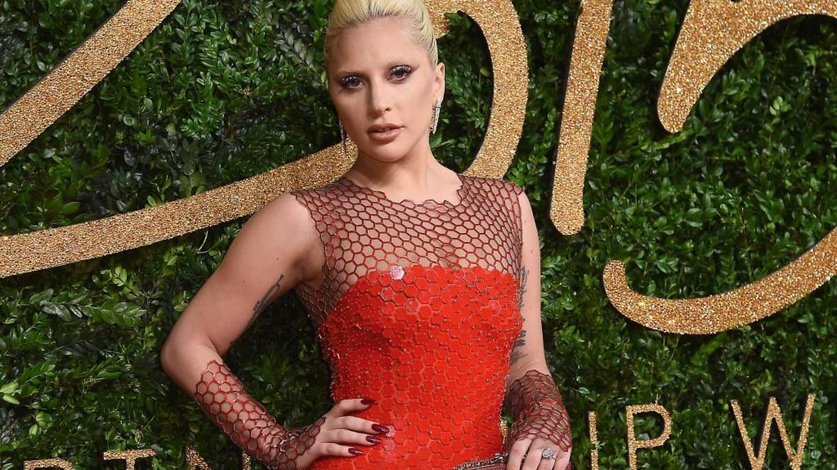 Lady Gaga poses for photographers upon arrival at the British Fashion Awards 2015 in London in November. The NFL said Tuesday that she will sing “The Star-Spangled Banner” at the Super Bowl on Sunday.