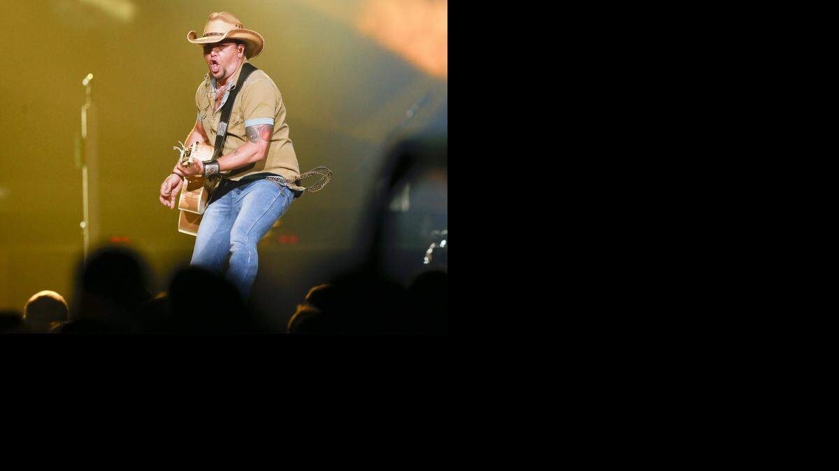 
Jason Aldean performs for the crowd at the Intrust Bank Arena on Thursday night. (April 9, 2015)
