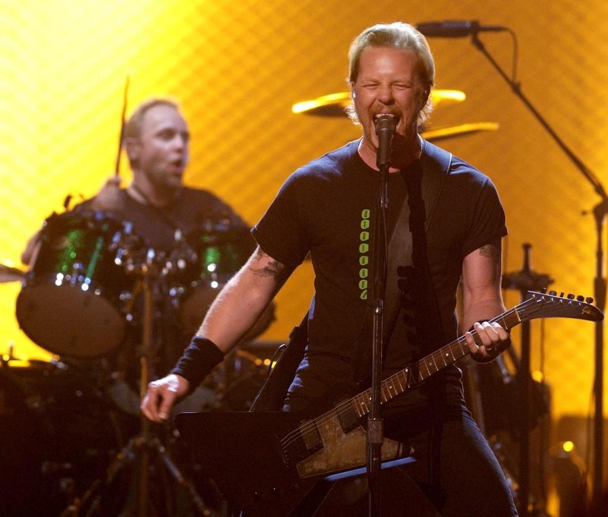Metallica, including James Hetfield, right, and Lars Ulrich, will perform in Wichita on Monday at an in-the-round concert.