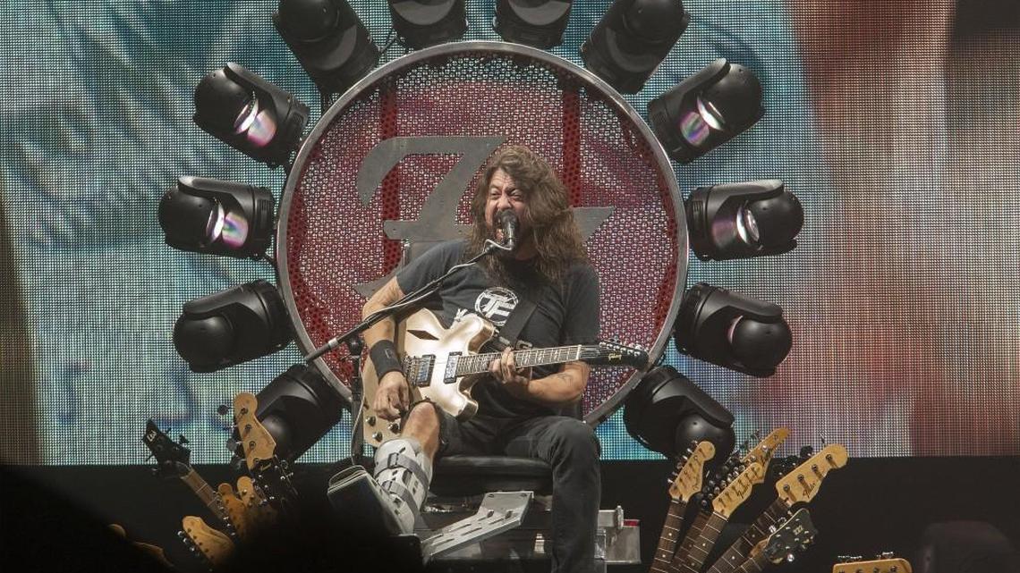 
Dave Grohl, frontman for the Foo Fighters, performs from his “throne” at the Sprint Center in Kansas City, Mo., in August. Grohl broke his leg earlier in the tour.
