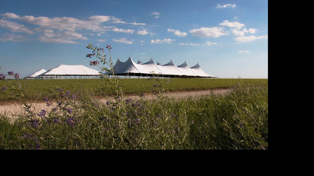
Crews are preparing tents and walking paths for the 10th Symphony in the Flint Hills concert at the Tallgrass Prarie National Preserve north of Strong City. 
