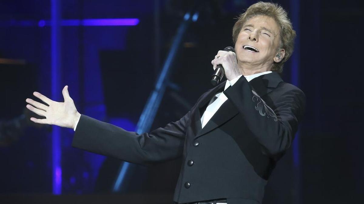 Barry Manilow performs before a large crowd at Intrust Bank Arena on Friday night.
