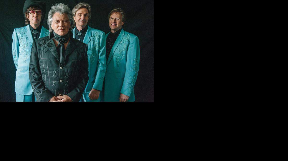 
Country singer Marty Stuart, center, has varied interests including photography and collecting artifacts.
