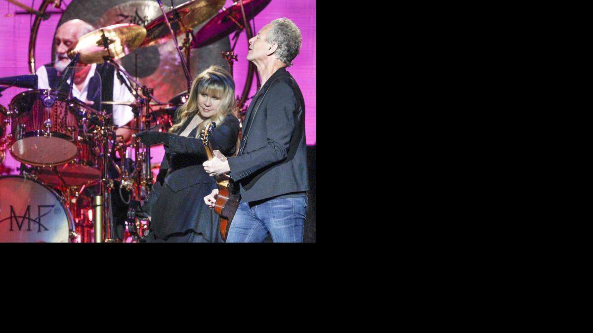 
Mick Fleetwood, left, Stevie Nicks and Lindsey Buckingham jam during their concert Tuesday night at Intrust Bank Arena. (March 31, 2015)
