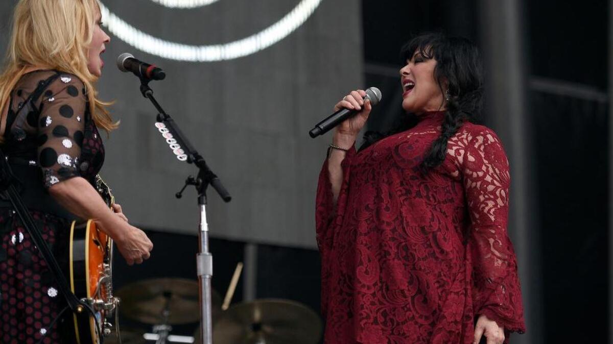 
Ann Wilson, right, and Nancy Wilson of Heart perform at RFK Stadium in Washington, D.C., on the Fourth of July this year. 
