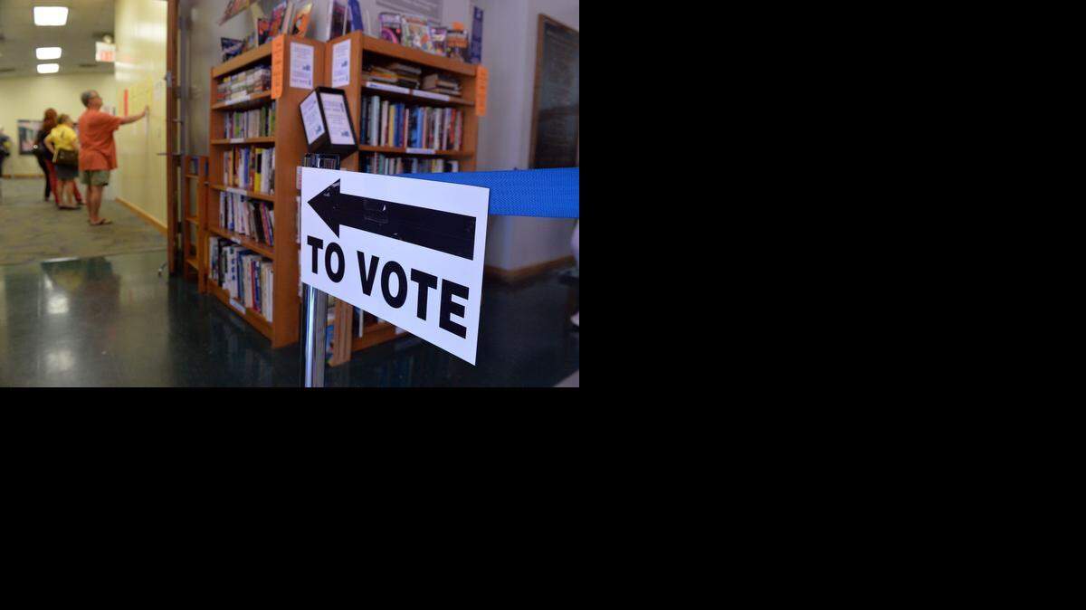 
A sign indicates the polling place at the Roswell, Ga., Public Library in Fulton County on a Sunday afternoon last fall, when 10 counties across Georgia had opened their polling places to test Sunday voting. It was on Jan. 23, 1845, that Congress decided all national elections would be held on the first Tuesday after the first Monday in November.
