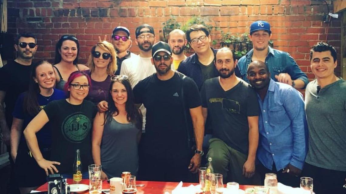 Magician David Blaine, front row, fourth from left, spent about two and a half hours dining and hanging out with the staff at Public at the Brickyard on Sunday afternoon.