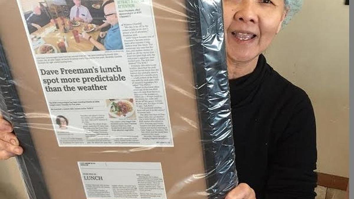 Kim Santana, mother of Little Saigon owner Rose Santana, loves the restaurant’s framed copy of the article we published about Dave Freeman’s weekly lunch date there.