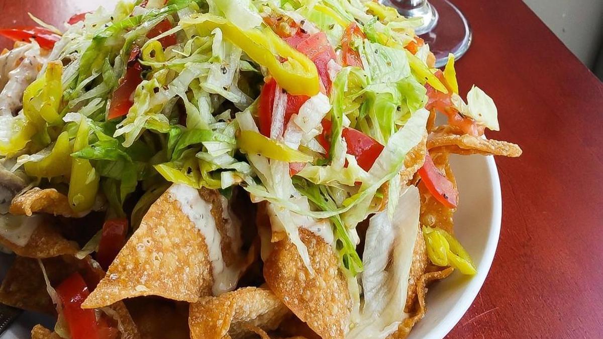 These Italian nachos from Albero Cafe earned the Wichita Nacho Review’s highest five-star rating.