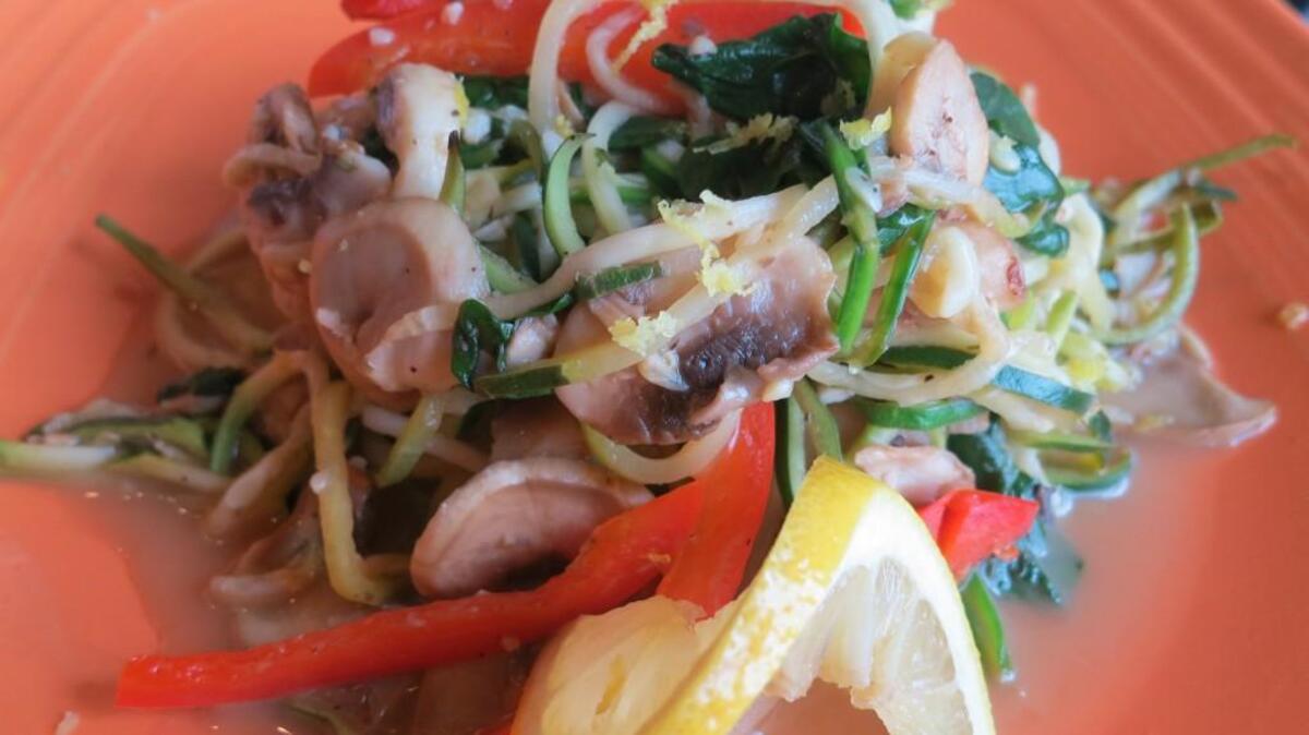 Lotus Leaf’s pasta primavera substitutes zucchini noodles for pasta.