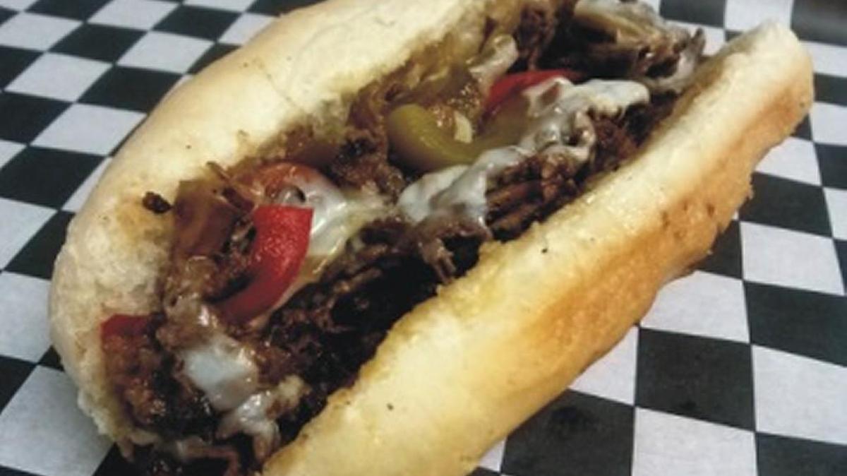 Wow Cheesesteaks is celebrating its grand opening with food discounts, music and cars.