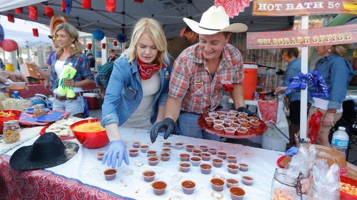 
Jeff Mitchell, right, and Regan Sangster of Beran Concrete were among the competitors at the 2014 Wagonmasters Downtown Chili Cookoff.
