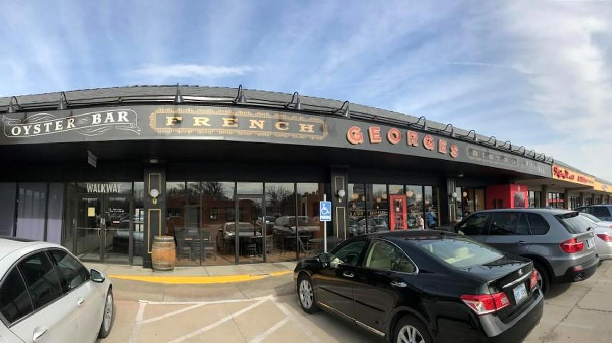 The big new sign outside Georges French Bistro is one of the first steps in a major remodel and expansion.