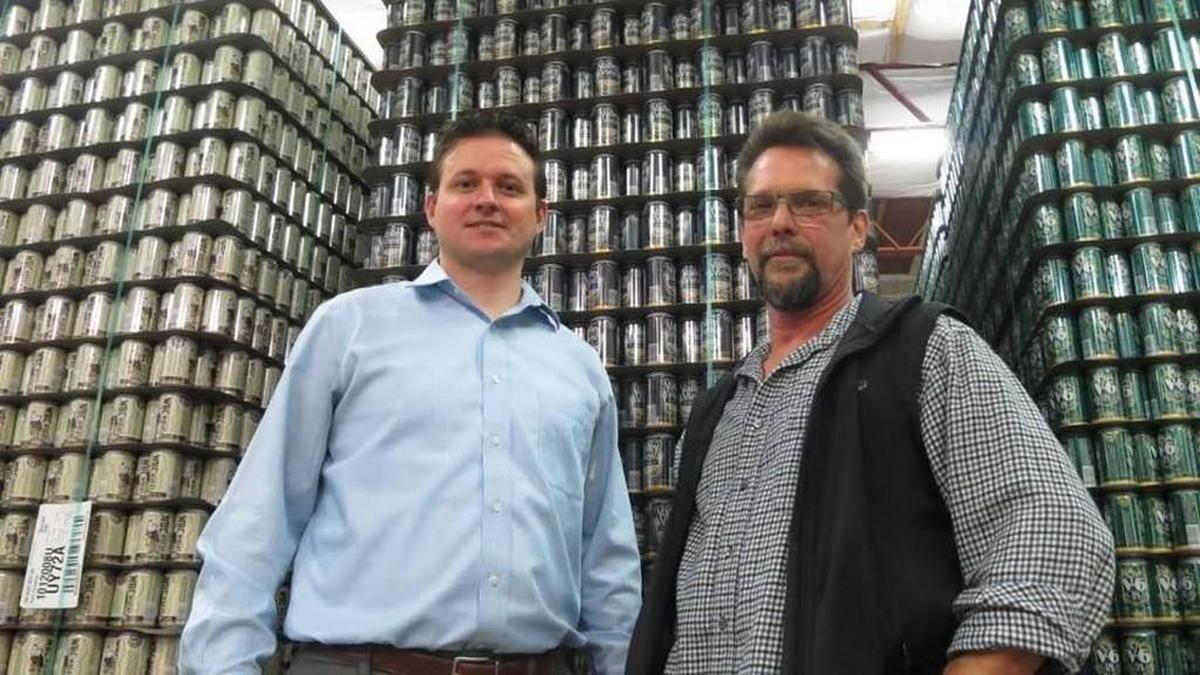 Jeremy Horn, left, and Greg Gifford are pictured in WBC’s brewing facility when it opened in 2016.