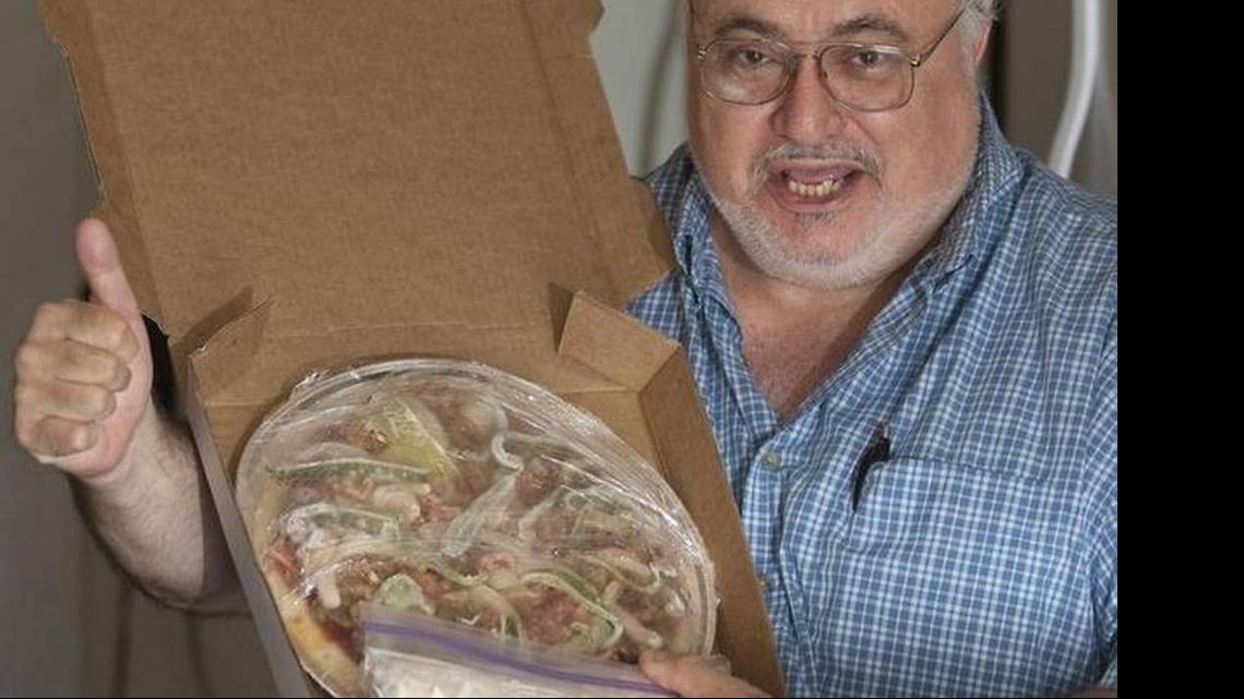 
Jack Fasciano and one of his bake-at-home pizzas.
