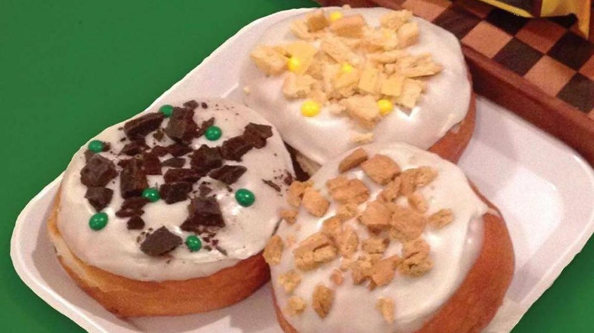 Paradise Donuts is selling doughnuts topped with Girl Scout cookies.