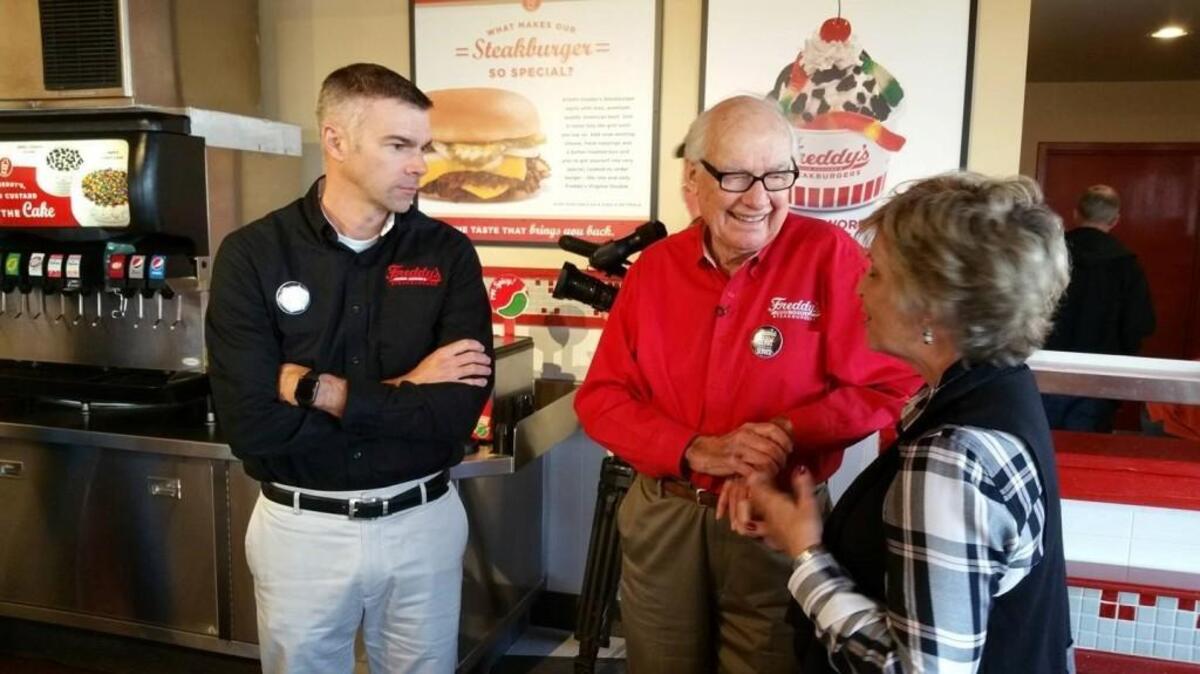 Freddy’s Frozen Custard namesake Freddy Simon, center, is turning 92 next week. But his celebratory custard is on sale now.
