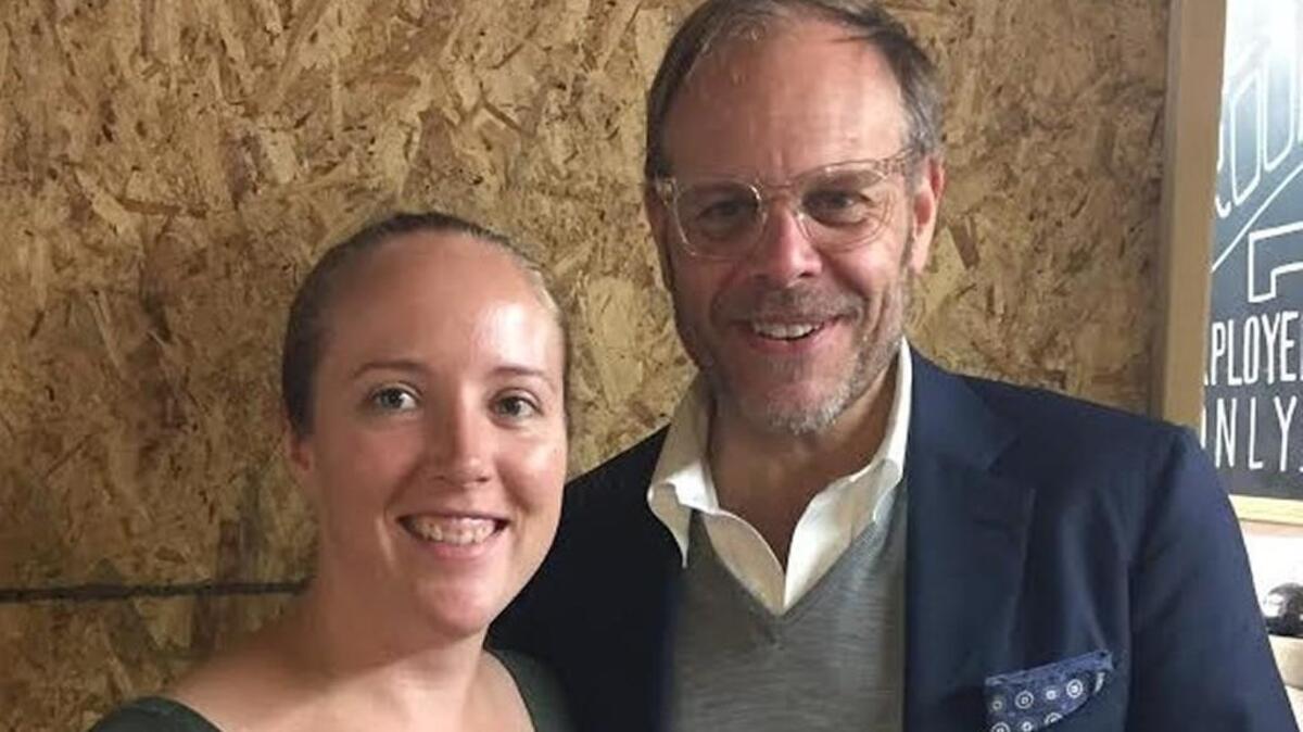Alton Brown stopped by Reverie Coffee Roasters on his way out of town Friday and posed for a picture with chef Stephanie Hand.