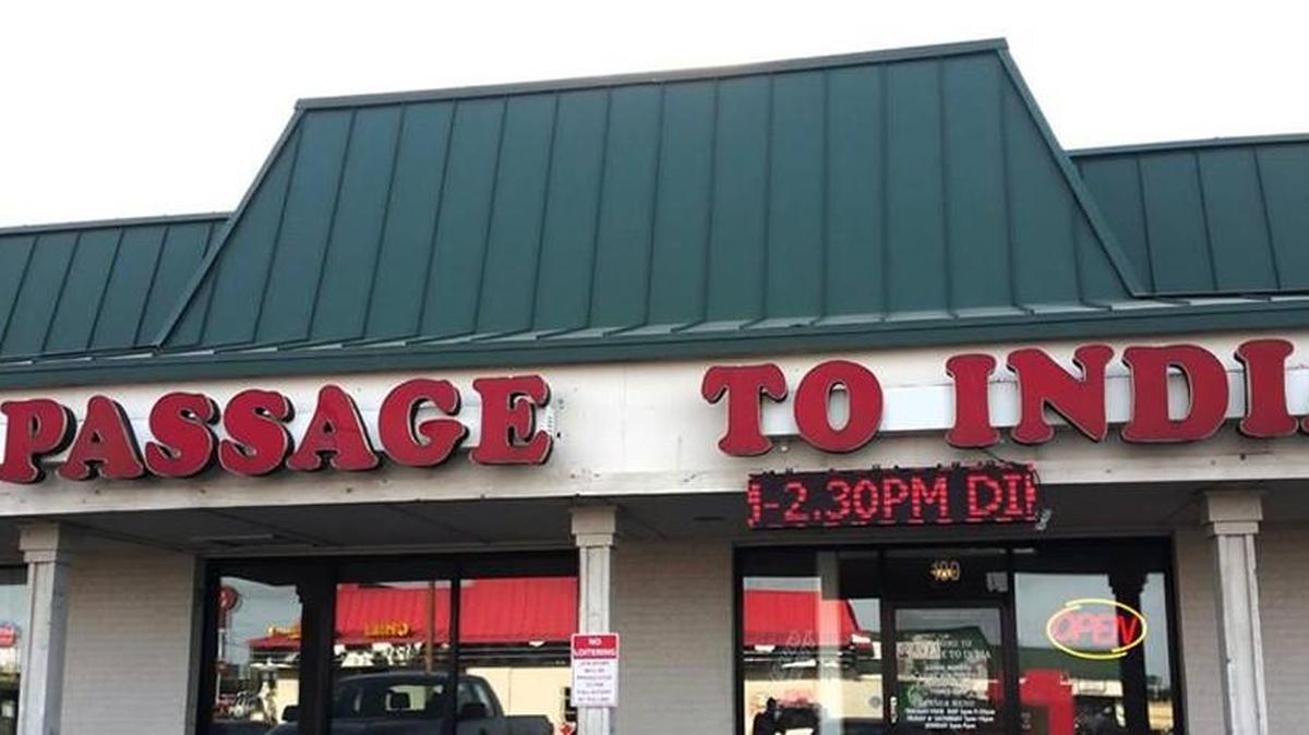 Passage to India is still open at 6100 E. 21st St., suite 180.
