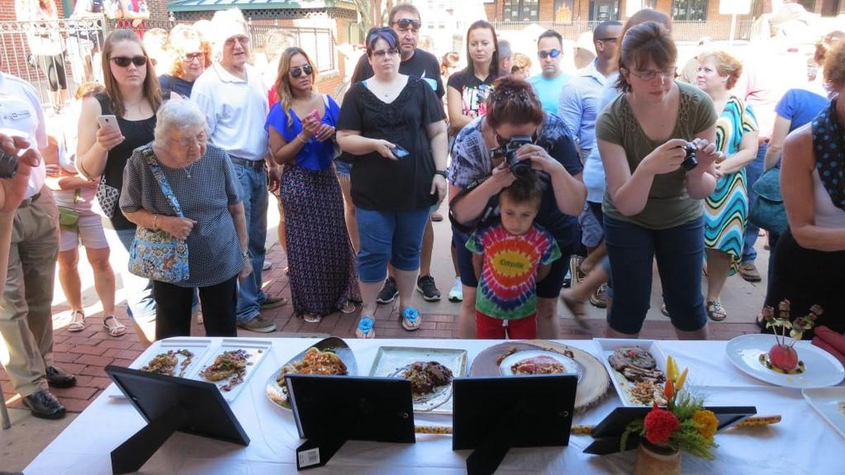 
Spectators at the 2014 Iron Chef event check out the entries.
