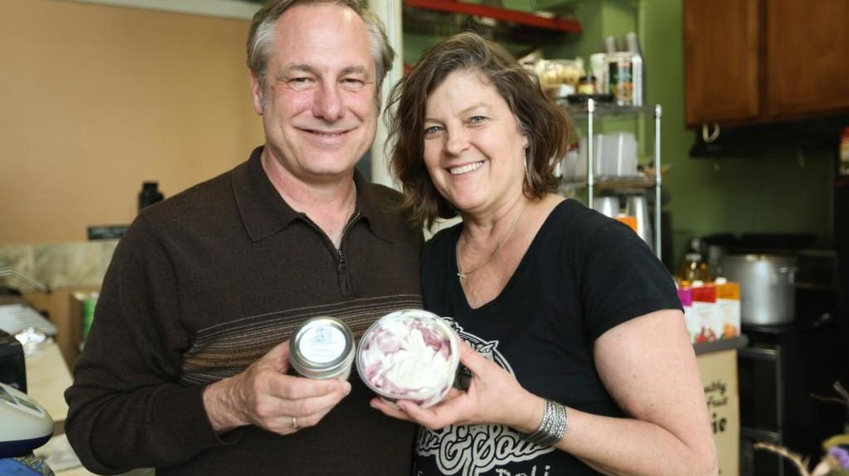 Tracey Coln, right, and her husband, Curtis, are closing their Cow and Sow Deli in downtown Wichita on Oct. 30. They’ll continue to serve late-night crowds on weekends while they look for a buyer for the business.